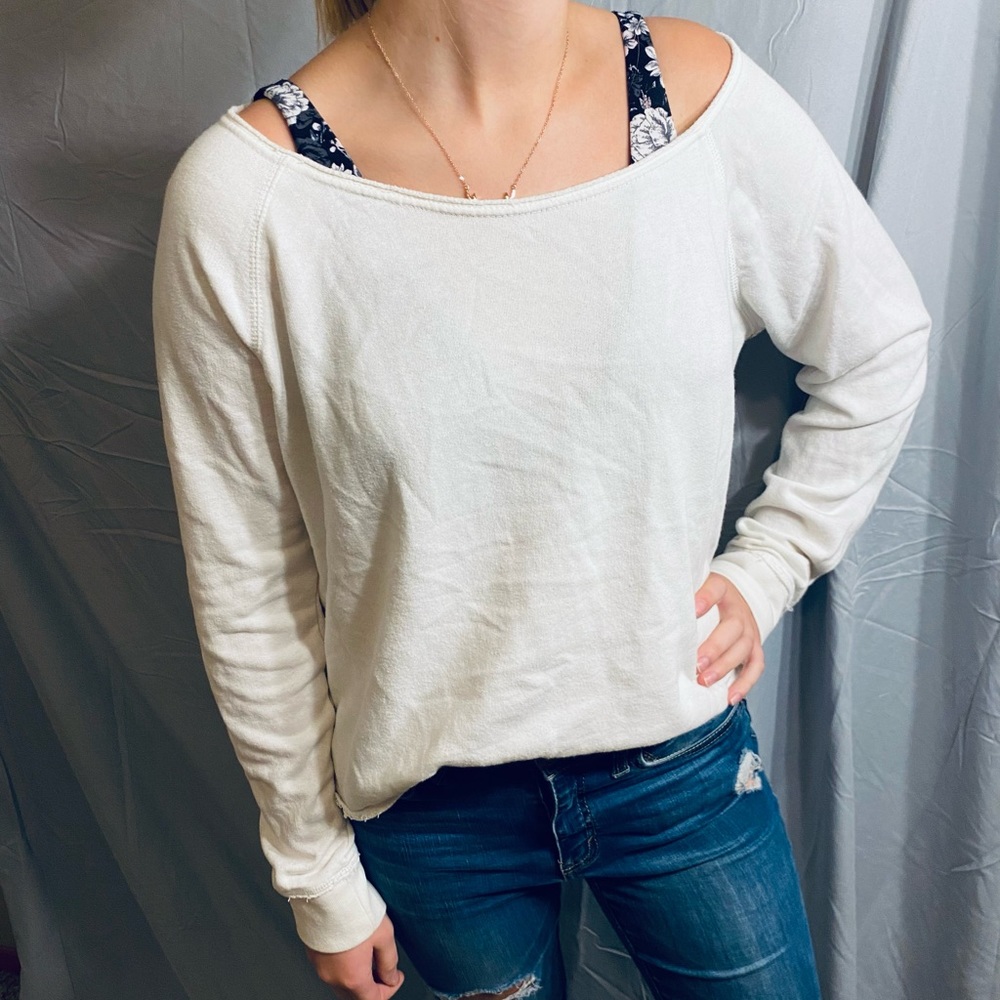 Aeropostale white long sleeve with a brown and white strips on the back. Large